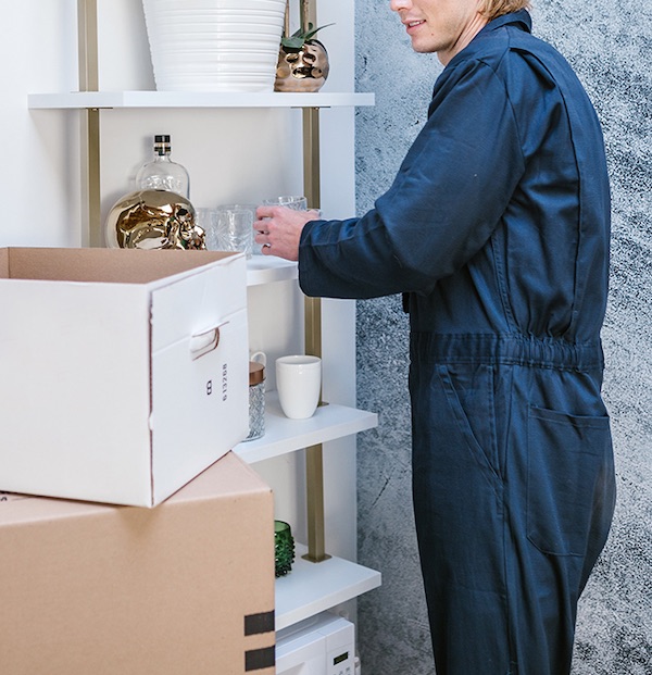 Superior Moving & Junk Removal Mover preparing everything for packing