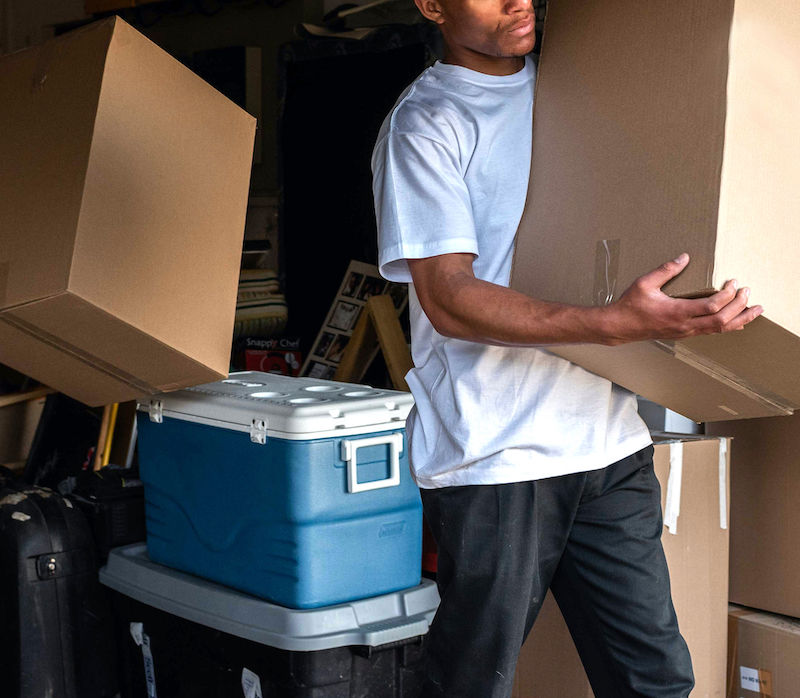 Superior Moving & Junk Removal preparing for a packing and junk removal service